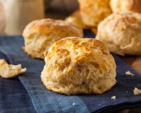 Freshly baked Southern buttermilk biscuits with golden flaky tops served warm for breakfast, brunch, weddings, and catered events by Bites of Charleston in Charleston, SC.